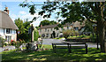 The centre of Ashbury, showing The Rose and Crown and the war memorial