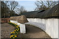 Old thatched cob walls near the Red Lion pub