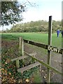 Alan King Way route marker on a stile at Wicor Copse