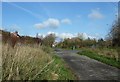 Path through Wicor Rec reaching the car park at the bottom of Birdwood Grove