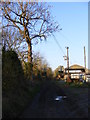 The entrance to Chapel Farm & Footpath to the B1117