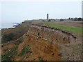 TM2623 : Walton on the Naze: cliffs and tower at The Naze by Chris Downer