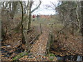 Concrete footbridge over Wellings Brook