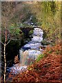 SD9931 : Waterfall and bridge at Lumb Hole by John H Darch