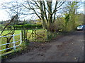 Footpath with stile leads off Five Bridges Road