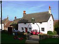 Pink-washed thatched cottage, Puddletown