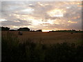 Harvested field by Church Farm, Oxhill at sunset