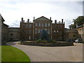 Aynhoe Park House and hand sculpture