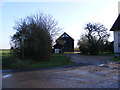 TM2871 : Footpath to Dennington Road & entrance to Burnt House Farm by Geographer