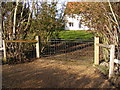 TM3667 : The gated  entrance to Corner Farm by Geographer