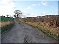 TL0198 : Gated farm access track by Christine Johnstone