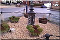 Traffic island and fundamental bench-mark, Great Bedwyn