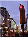 TQ2881 : London: covered traffic light in Oxford Street by Chris Downer
