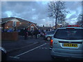 Traffic waiting at pedestrian crossing by Larkhall Primary School