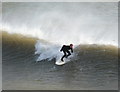 SZ0890 : Bournemouth: a surfer by the pier by Chris Downer