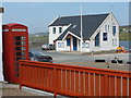 HU3455 : Aith: telephone box and lifeboat station by Chris Downer