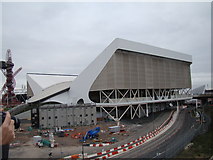 TQ3884 : View of the Aquatics Centre from Westfield Way by Robert Lamb