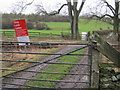 Level crossing on the Weardale Railway for a footpath on a farm track