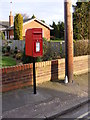 TM2046 : 2 Holly Lane Postbox by Geographer