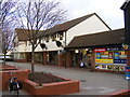 TM2445 : Shops in The Square, Martlesham Heath by Geographer