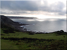 SW3529 : Looking back towards Sennen Cove on the climb to Carn Polpry by John Lucas