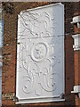 Decorative panel on a house in St. John