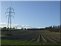 TQ5263 : Ploughed field and pylons near Lullingstone by Malc McDonald