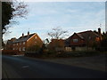 Vapour trail above the B3006 at Selborne