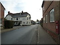 Looking from a postbox across the B3006 towards The Queen