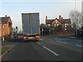 SJ5561 : A49 at Four Lane Ends traffic lights by Peter Whatley