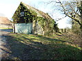 Buttress support for barn near Hammond