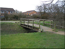 SJ6291 : Footbridge over the Brook by Mike Lyne