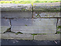 Bench mark on a former fountain in Newsham Park