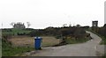 Parish church, old school building, a ruined castle and a blue bin at Bright