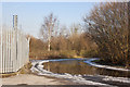 A frozen road and fences