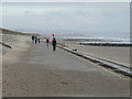 Family walk on the prom at Prestatyn