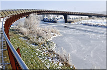 TL2398 : Shanks Millennium Bridge over frozen Nene by Julian Dowse