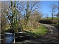 Stream and lane near Upcott Mill