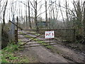 Gate, barbed wire and razor wire