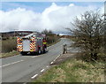 Fire engine on an emergency callout heads north along Abergavenny Road, Blaenavon