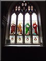 Stained glass window showing the four evangelists