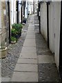 NZ9504 : Chapel Street cobbles by Mike Kirby
