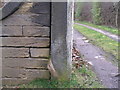 Cut benchmark on a gatepost at Westwood Lodge