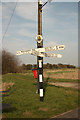 TF0669 : Branston Booths fingerpost by Richard Croft