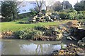 Pond and rocks in Sandford Park ornamental gardens