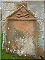 NY6323 : Weathered gravestone, All Saints Church, Bolton by Karl and Ali
