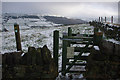 SE0025 : Kissing gate on footpath above Martin Wood, Mytholmroyd by Phil Champion