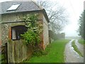 Bridleway passes dwelling in Up Marden