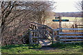 Footbridge and path signs near Moulin