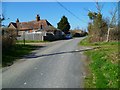 Footpath crosses Binsted Lane by Oakley Cottages